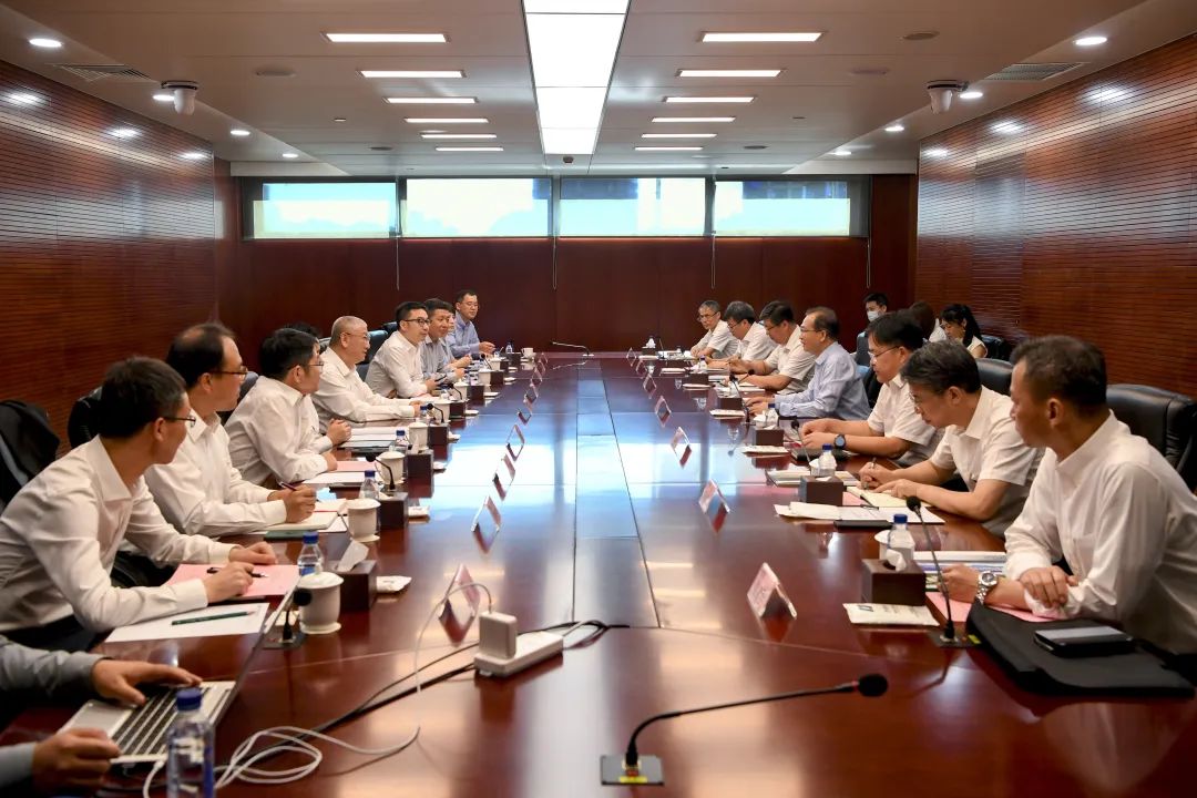 華電集團黨組書記、董事長江毅會見隆基綠能總裁李振國